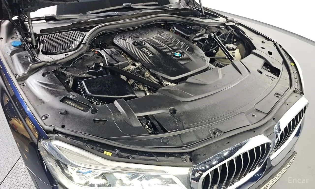 BMW 740 * 740d xDrive M Sport * CARFAX * ЦЕНА ДО БГ, снимка 17 - Автомобили и джипове - 55511049