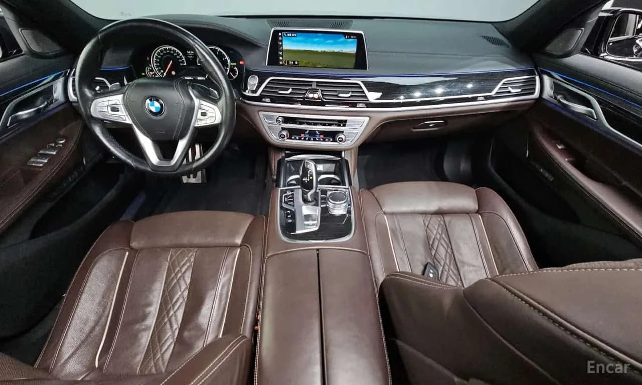 BMW 740 * 740d xDrive M Sport * CARFAX * ЦЕНА ДО БГ, снимка 7 - Автомобили и джипове - 55511049