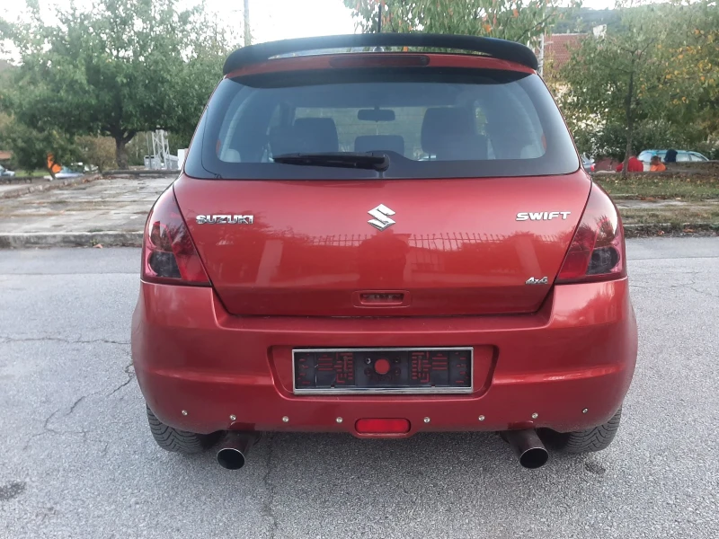 Suzuki Swift 1.3i 4x4 KLIMA NAVI PODGREV, снимка 3 - Автомобили и джипове - 47582840