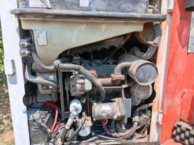 Мини челни товарачи Bobcat 453, снимка 8