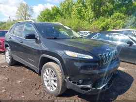 ������ Jeep Cherokee