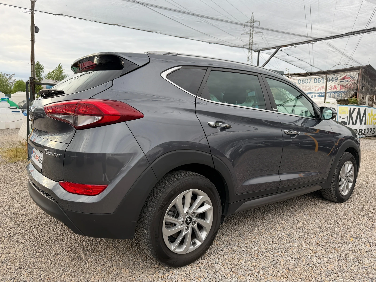 Hyundai Tucson 1.7CRDI AUT/NAVI/СЕРВИЗНА ИСТОРИЯ, снимка 4 - Автомобили и джипове - 54457669