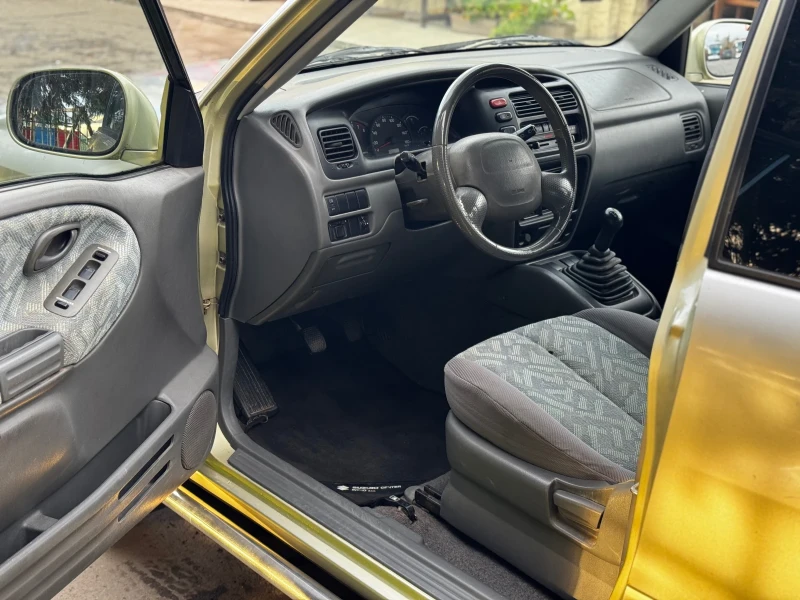 Suzuki Grand vitara 1.6i* 94к.с.* Климатик, снимка 11 - Автомобили и джипове - 52513206