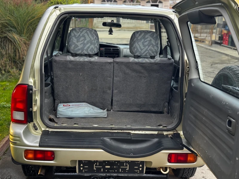 Suzuki Grand vitara 1.6i* 94к.с.* Климатик, снимка 5 - Автомобили и джипове - 52513206