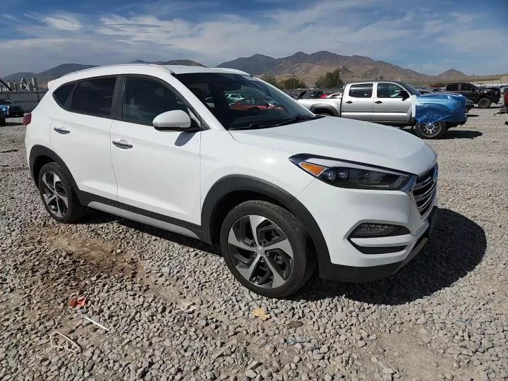 Hyundai Tucson 1.6l Limited, снимка 13 - Автомобили и джипове - 56025532