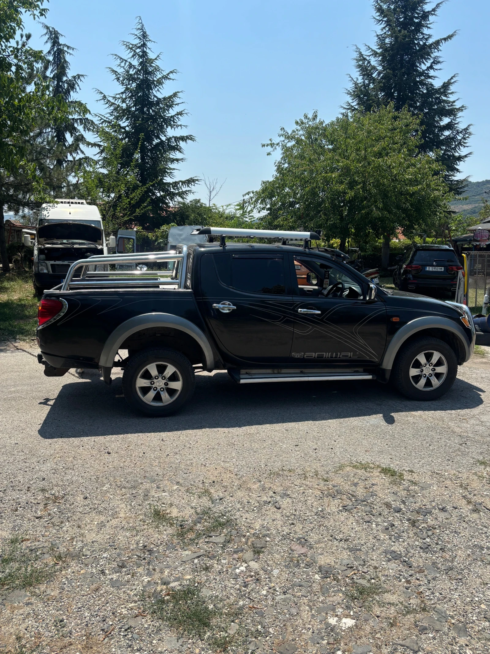 Mitsubishi L200, снимка 9 - Автомобили и джипове - 55339054