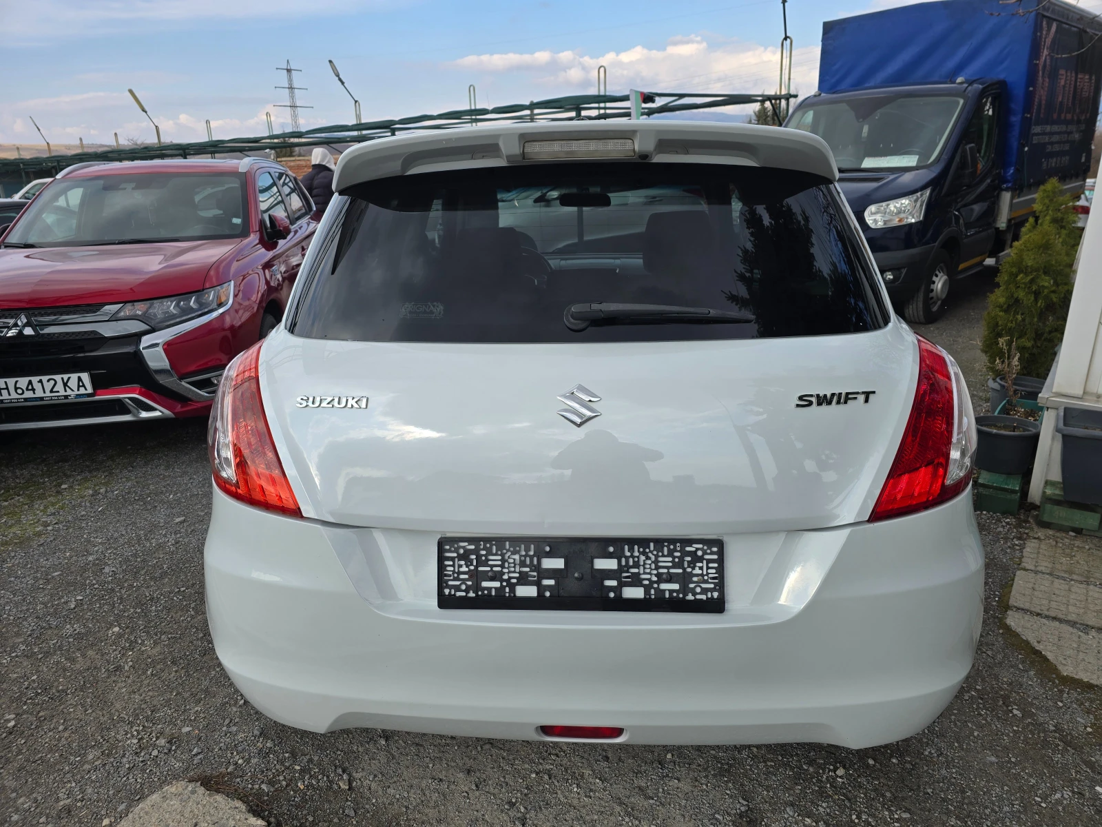 Suzuki Swift 1.3i-Facelift, снимка 5 - Автомобили и джипове - 53724345