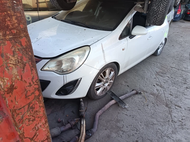 Opel Corsa 1.3mjet z13DTH, снимка 10 - Автомобили и джипове - 45613906
