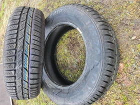 Гуми Зимни 165/70R14, снимка 2 - Гуми и джанти - 48349256