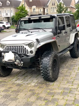 Jeep Wrangler * Sahara JKU* LIFTED* 35 Tires* ЛЕБЕДКА* 6-Speed M, снимка 1